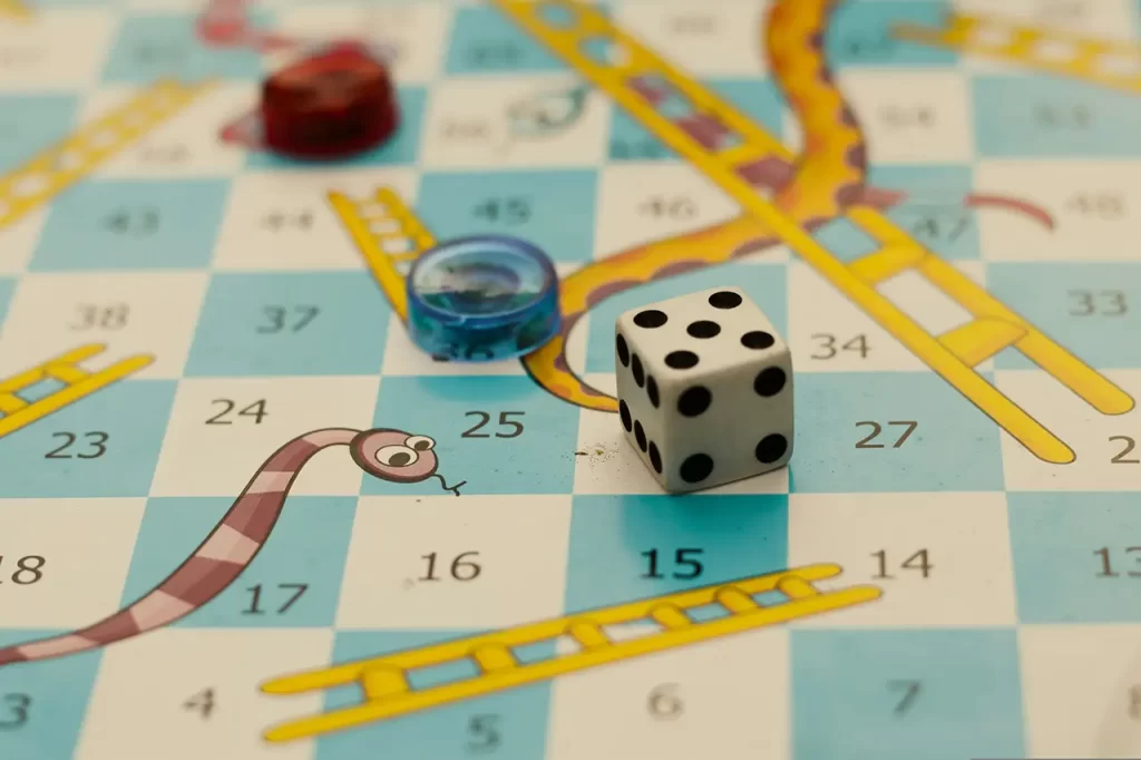 Snakes and ladders board game